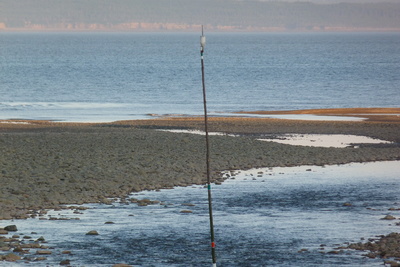 low tide and navigation pole